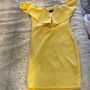 Yellow brunch dress. Never worn. Tag still attracted.